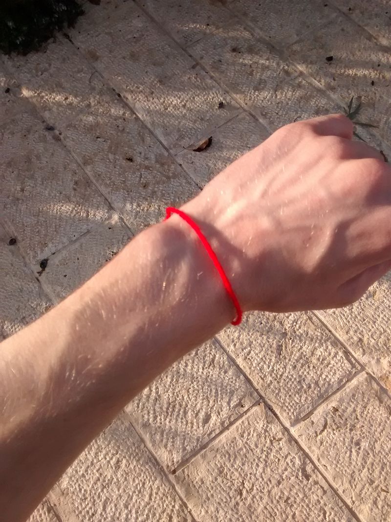 Wearing a red string bracelet has many positive effects on one's mind and body. Protection, good fortune, prosperity, and success.