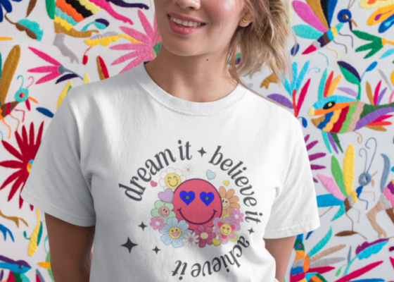 Dream it t-shirt-mockup-of-a-pretty-woman-smiling-in-front-of-a-colorful-background-26643